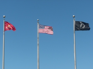 L-R: U.S. Marine Corps flag, American Flag, POW Flag-Belton, MO 6-6-10-Sun