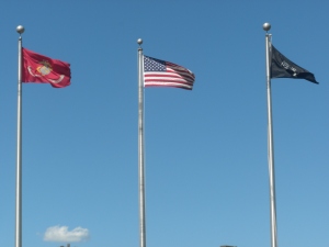 L-R: U.S. Marine Corps flag, American Flag, POW Flag-Belton, MO 6-6-10-Sun